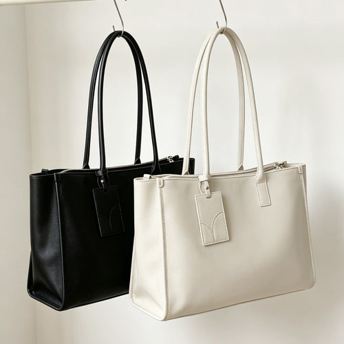 Glattes veganes Leder strukturiert Top-Zip Tote mit doppelten gerollten Griffen und Gepäckanhänger