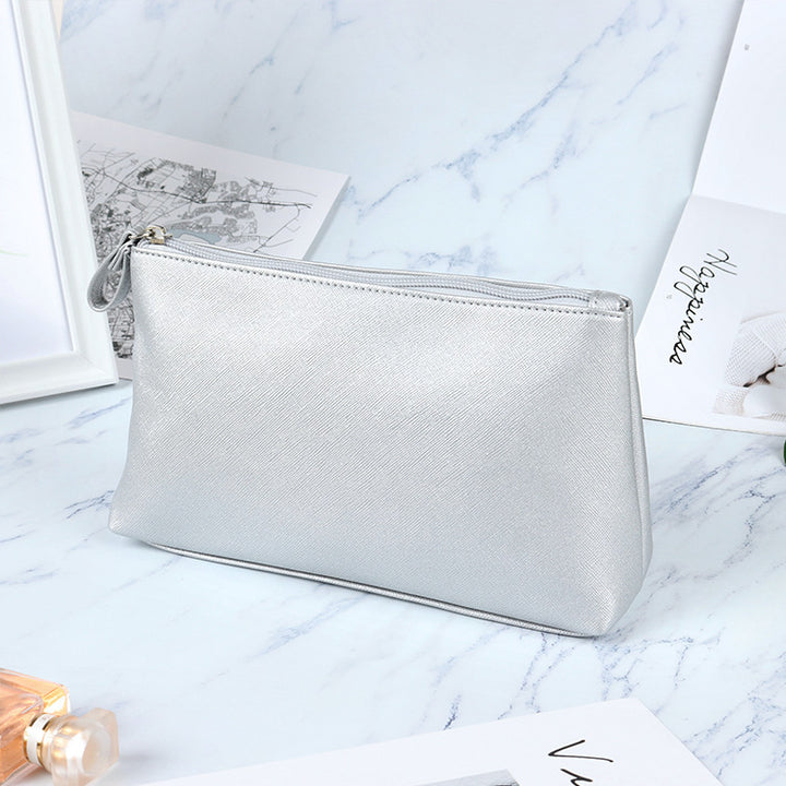 Elegante metallische Schminktasche