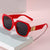 Damen modische oversized Sonnenbrille mit luxuriösen Metallelementen Karnz