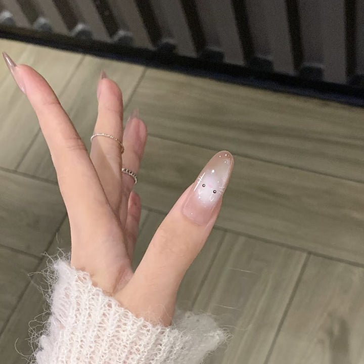 Künstlerisches Press-On-Nagelset mit verspielten Tiermotiven Karnz