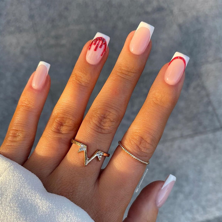 Elegante Stiletto Press-On Nagelkunst mit Strass-Akzenten Karnz