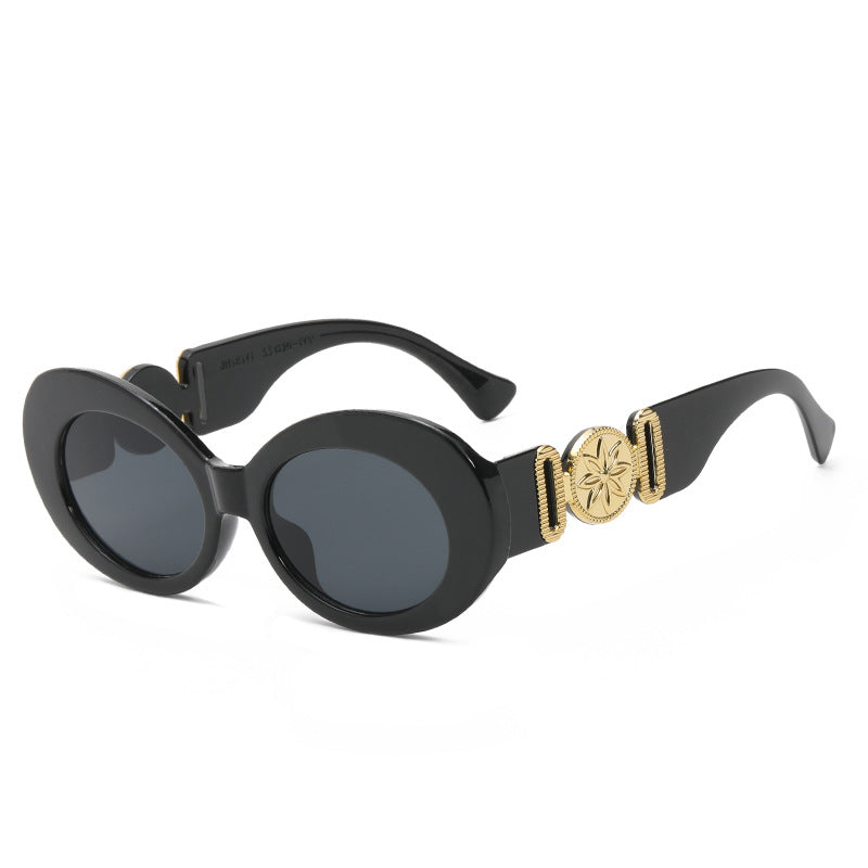 Damen modische Sonnenbrille mit auffälligen goldenen Akzenten Karnz