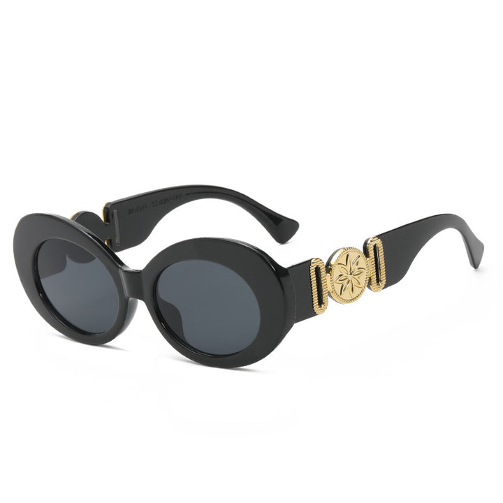 Damen modische Sonnenbrille mit auffälligen goldenen Akzenten Karnz