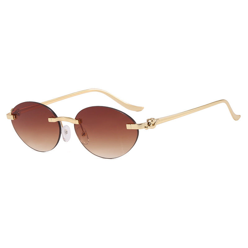 Damen elegante ovale Sonnenbrille mit goldenen Akzenten Karnz