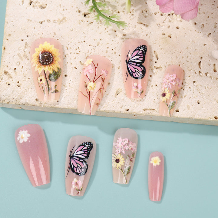 Kunstnägel mit floralen und sommerlichen Motiven Karnz