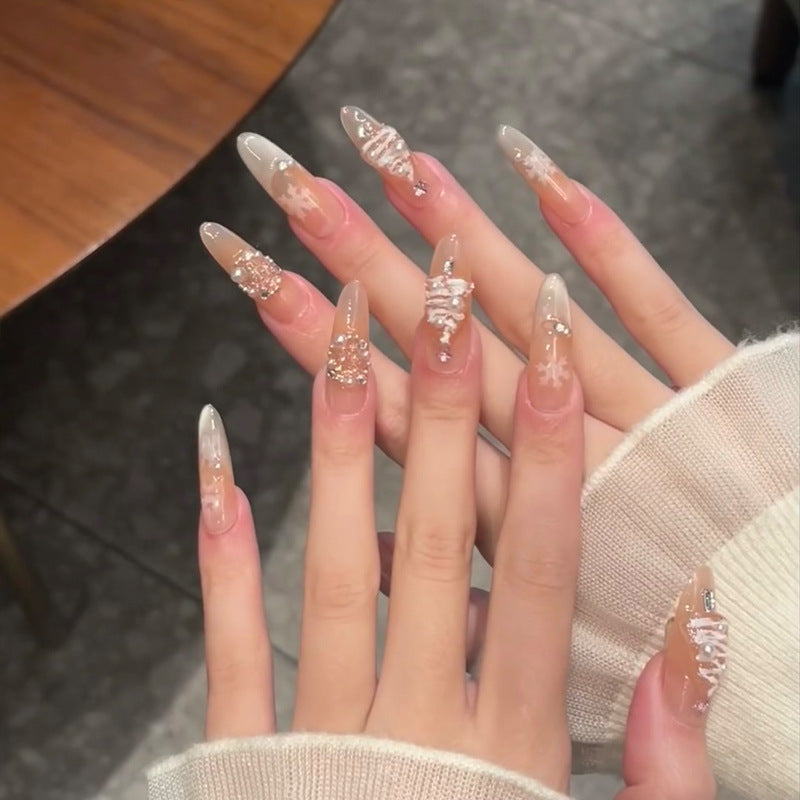 Künstlerisches Press-On-Nagelset mit dekorativen Edelsteinakzenten Karnz
