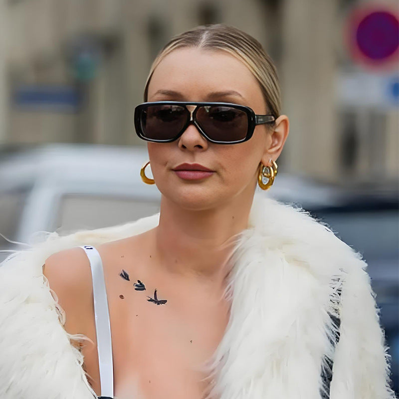 Damen modische oversized Sonnenbrille mit breitem Rahmen und schützenden Gläsern Karnz