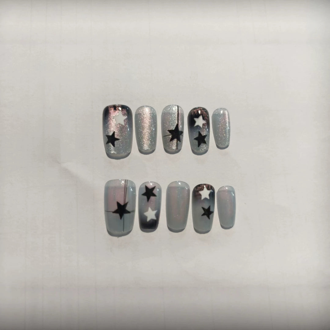 Künstlerisches Sternmuster Press-On Nagelset Karnz