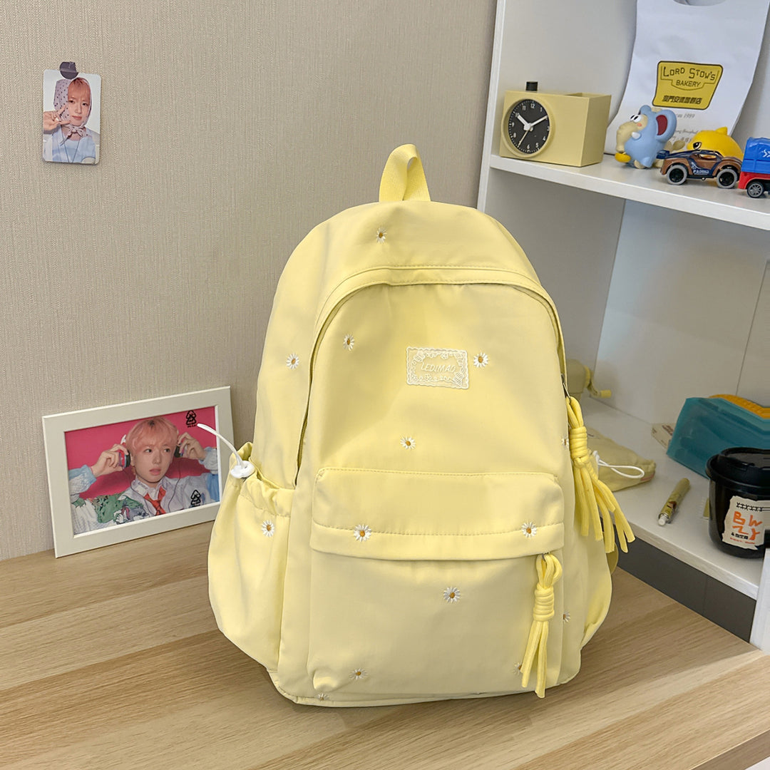 Stylischer backpack mit floralem Schmuck Karnz