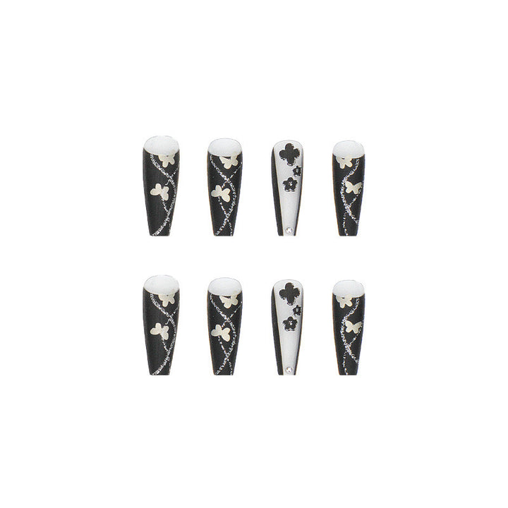 Kunstnagelset mit eleganten Schmetterlings- und Blumenmotiven Karnz
