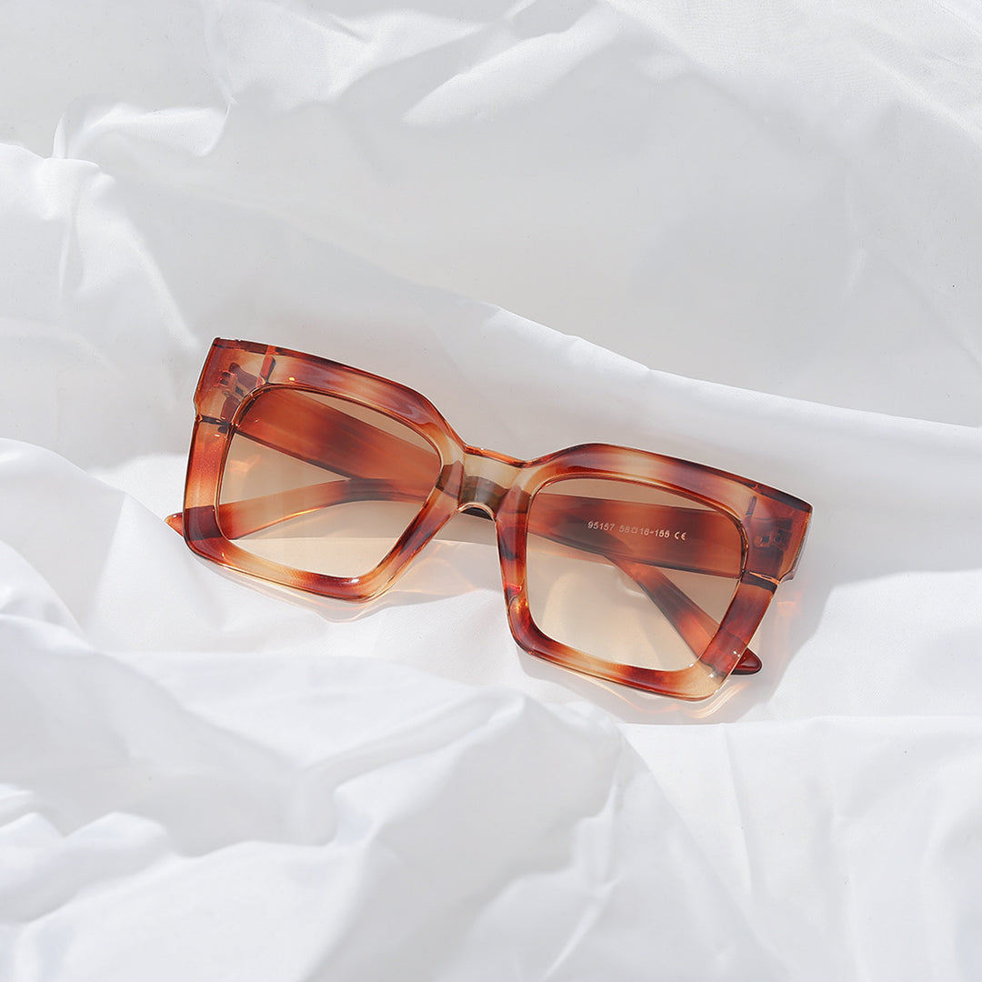Damen modische quadratische Sonnenbrille mit transparentem Rahmen Karnz