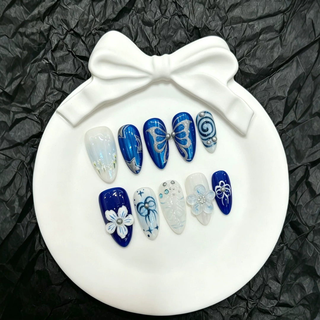 Dekorative Schmetterlings Press-On Nagelkunst Kollektion