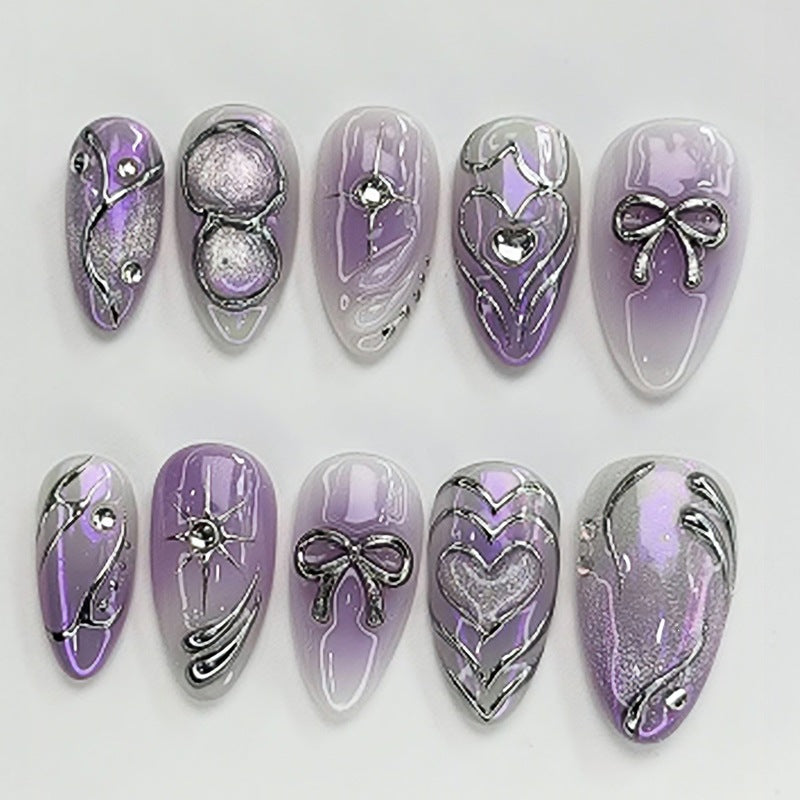 Kunstnagelset mit elegantem Ombre-Design und filigranen Verzierungen Karnz