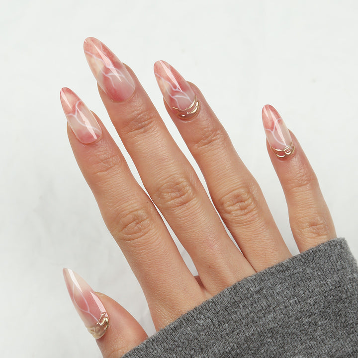 Elegante Stiletto Press-On Nagel Set mit Marmor Design Karnz