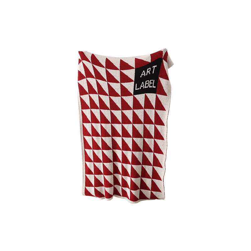Grobgewebte Wohndecke mit geometrischem Jacquardmuster und weichem Bouclé Karnz