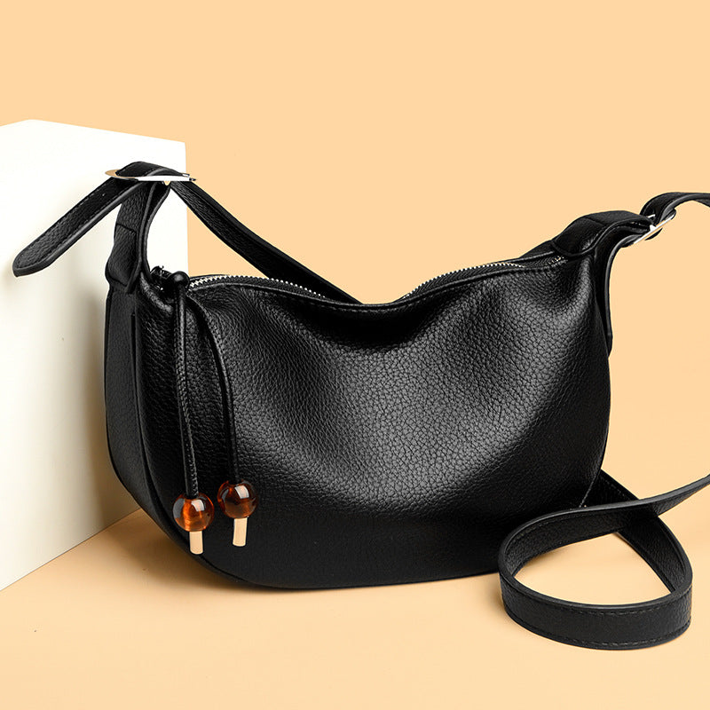 Lässige strukturierte Leder-Slingtasche Karnz