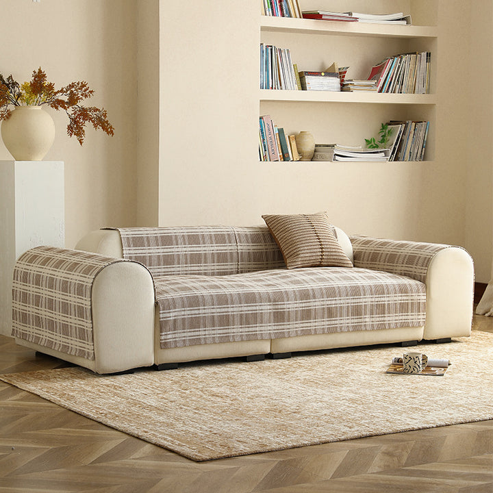 Stretch-Sofaüberwurf mit kariertem Jacquard-Muster und abnehmbaren Armlehnbezügen Karnz