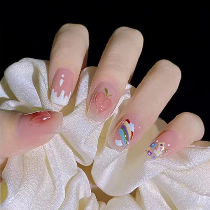 Kreative Nagelkunst mit Obst- und Blumenmotiven Karnz