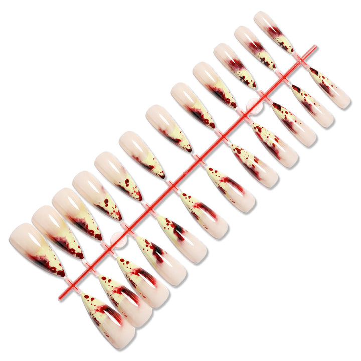 Künstlerisches Stiletto Press-On Nagelset mit tropfendem Design Karnz