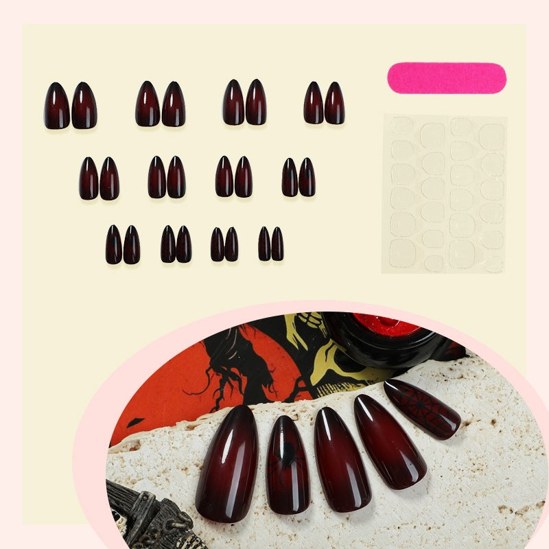 Kunstnagelset mit eleganten und tiefroten Nuancen Karnz