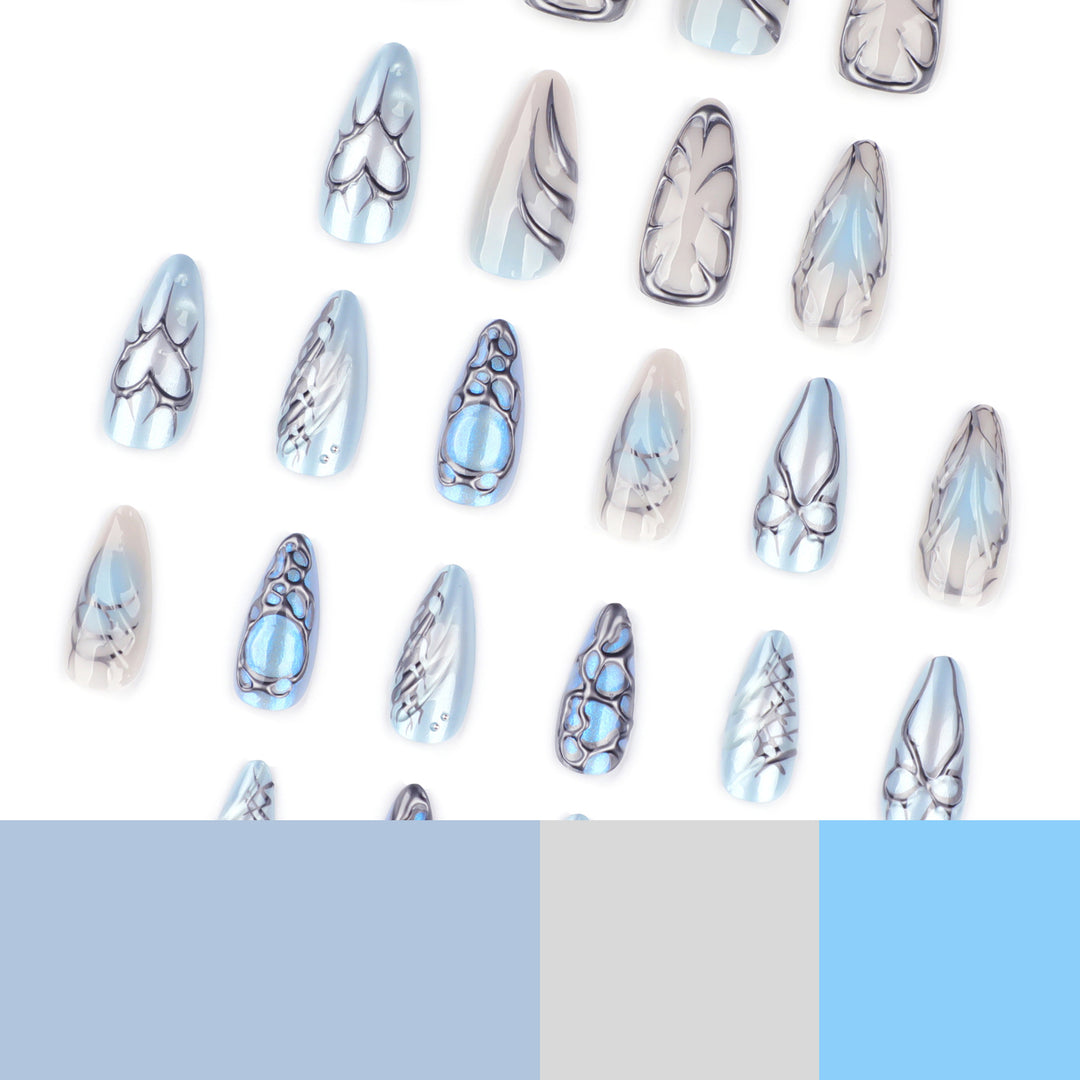 Kunstvolle Stiletto-Nägel mit verspielten Metallic-Details Karnz