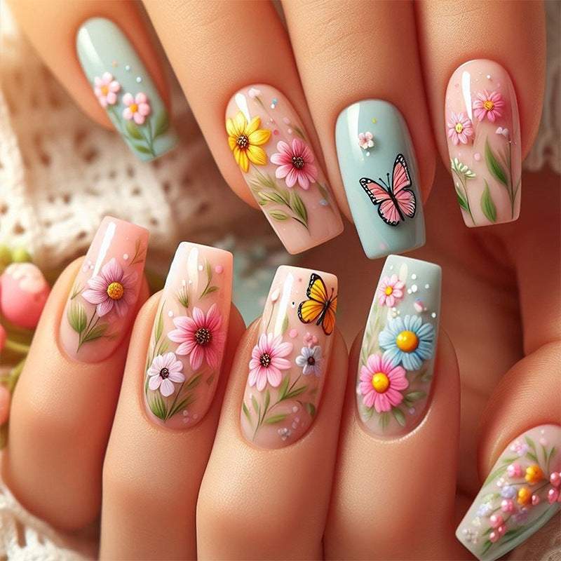 Dekoratives Press-On Nagelkunst Set mit Blumen- und Schmetterlingsdesigns Karnz
