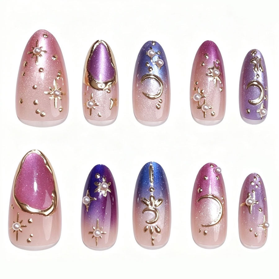 Kunstnagelset mit glamourösen Sternenmotiven Karnz