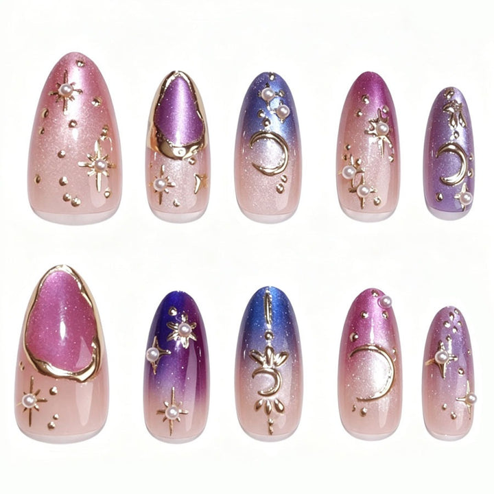 Kunstnagelset mit glamourösen Sternenmotiven Karnz