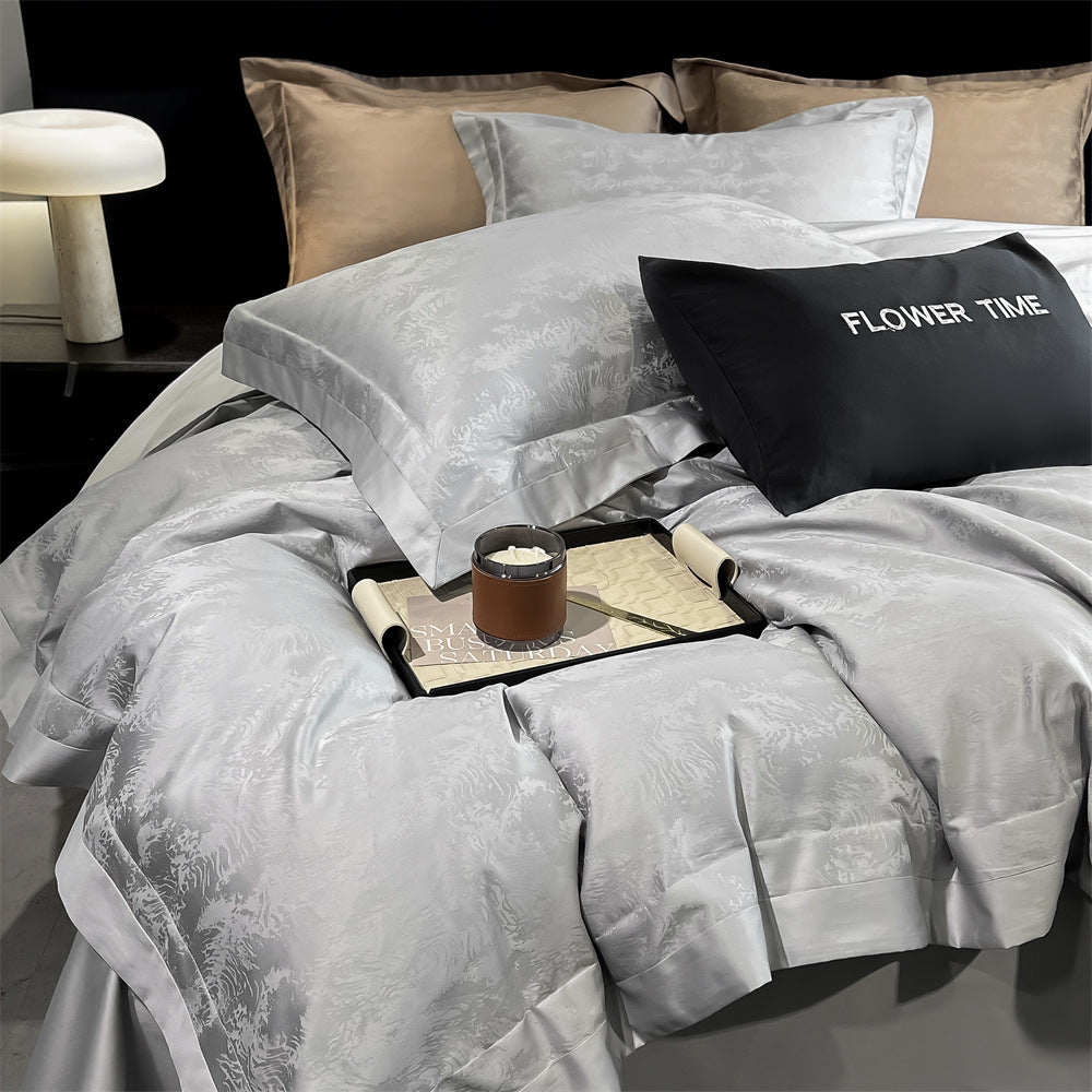 Luxuriöse Baumwollsatin-Bettwäschegarnitur mit Jacquard-Relief und Kontrastpaspel