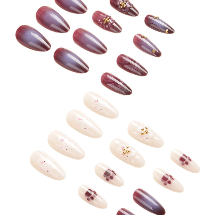 Blumenverzierte Stiletto-Nagelkunst Karnz