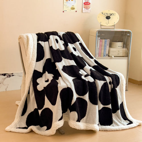 Gemütliche floral gemusterte Fleece-Decke