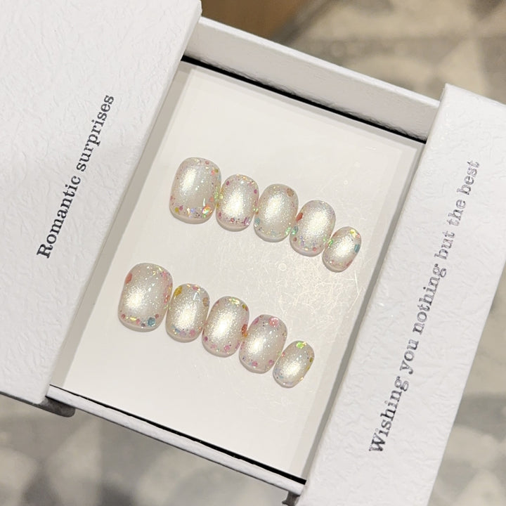 Kunstnagelset mit Romantischem Glitzereffekt Karnz
