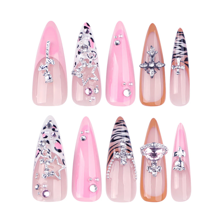 Kunstvolle Stiletto-Nägel mit Glitzer- und Strassverzierungen Karnz