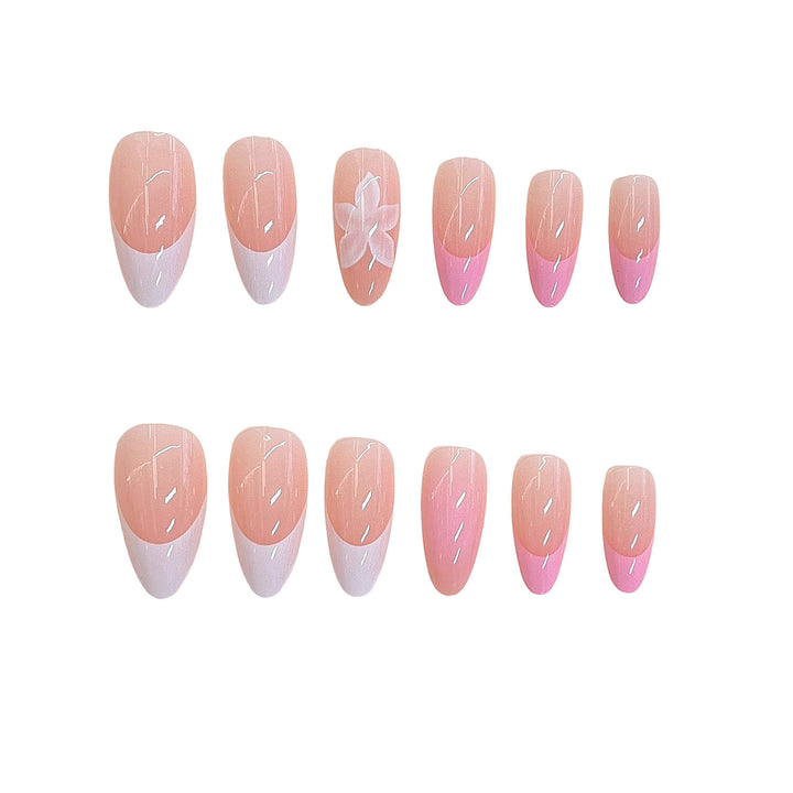Künstlerisches floral Press-on Nageldesign Karnz