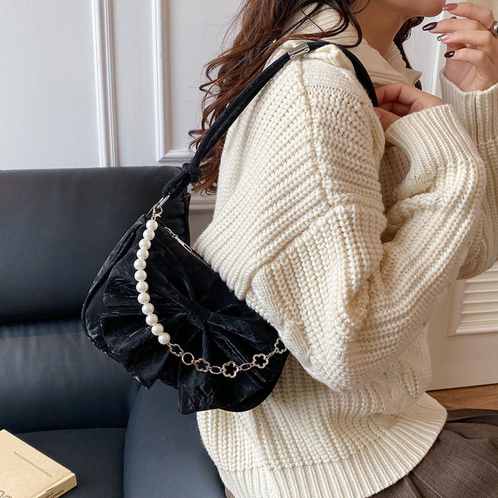 Elegante mit Schleife verzierte Handtasche Karnz