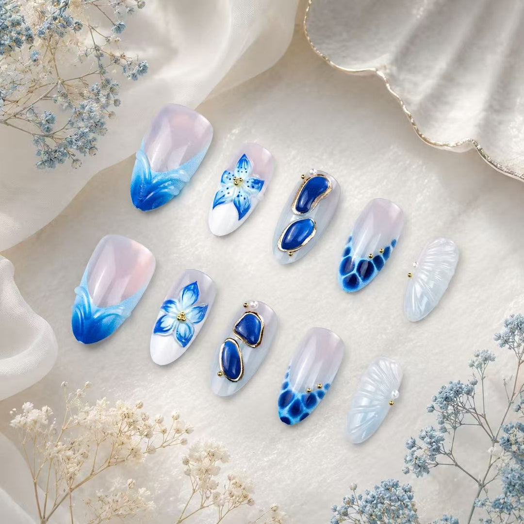 Künstlerisches Press-On Nagelspitzen-Set mit floralen und geometrischen Mustern Karnz