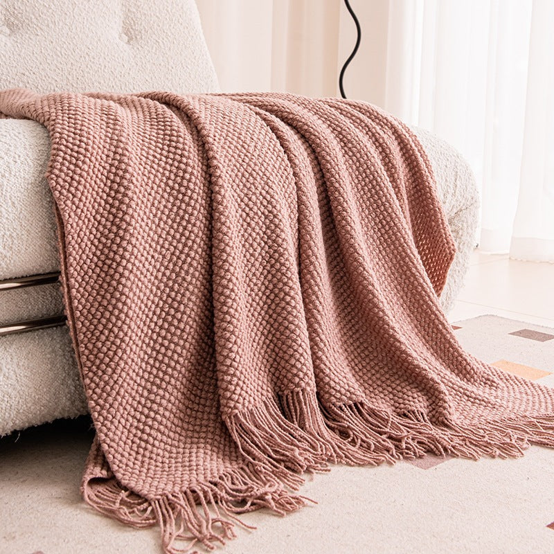 Strukturierte Strickwurfdecke