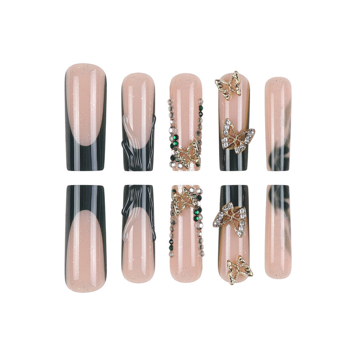 Dekorative Lange Press-On-Nagelset mit Schmuckakzenten Karnz