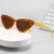 Damen stilvolle Cat-Eye Sonnenbrille mit auffälligem Design Karnz