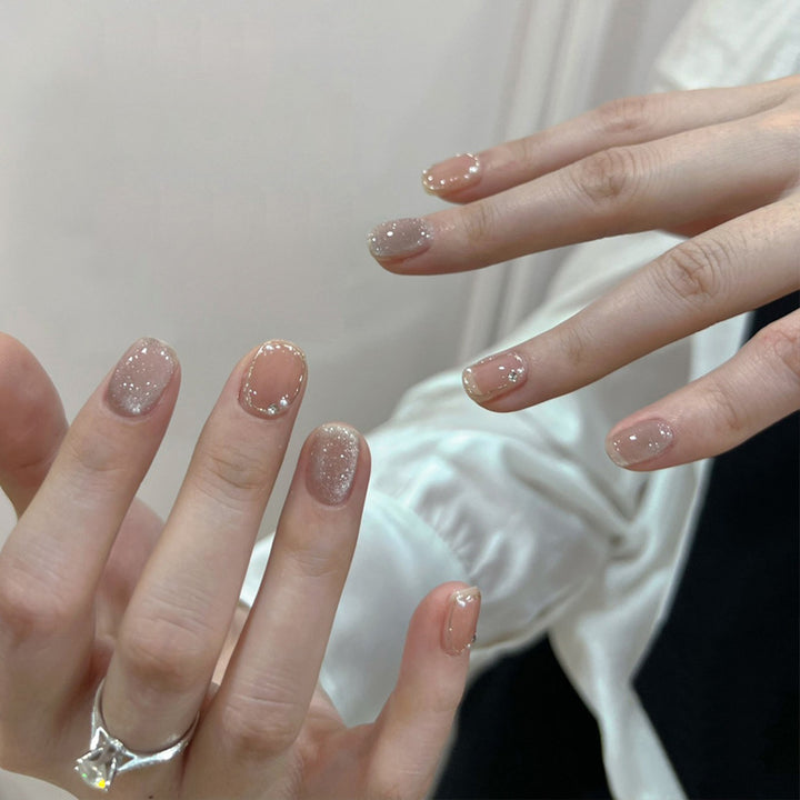 Künstlerisches Press-On-Nagelset mit glitzernden Sternakzenten Karnz