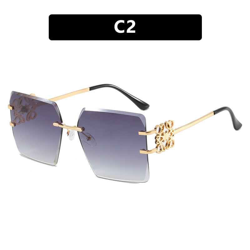 Damen modische Sonnenbrille mit außergewöhnlichem Design und goldenen Akzenten Karnz