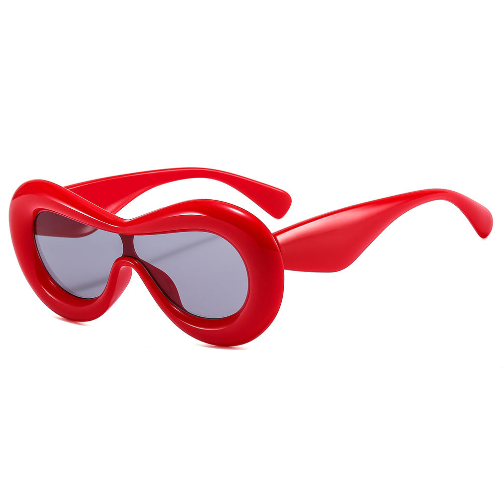 Damen modische Sonnenbrille mit nostalgischem Schwung Karnz