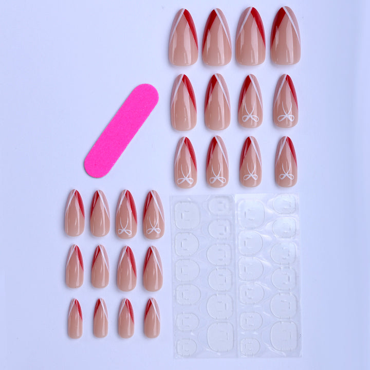 Kunstfingernägel Im Eleganten Stiletto-Design mit Schleifen-Akzenten Karnz