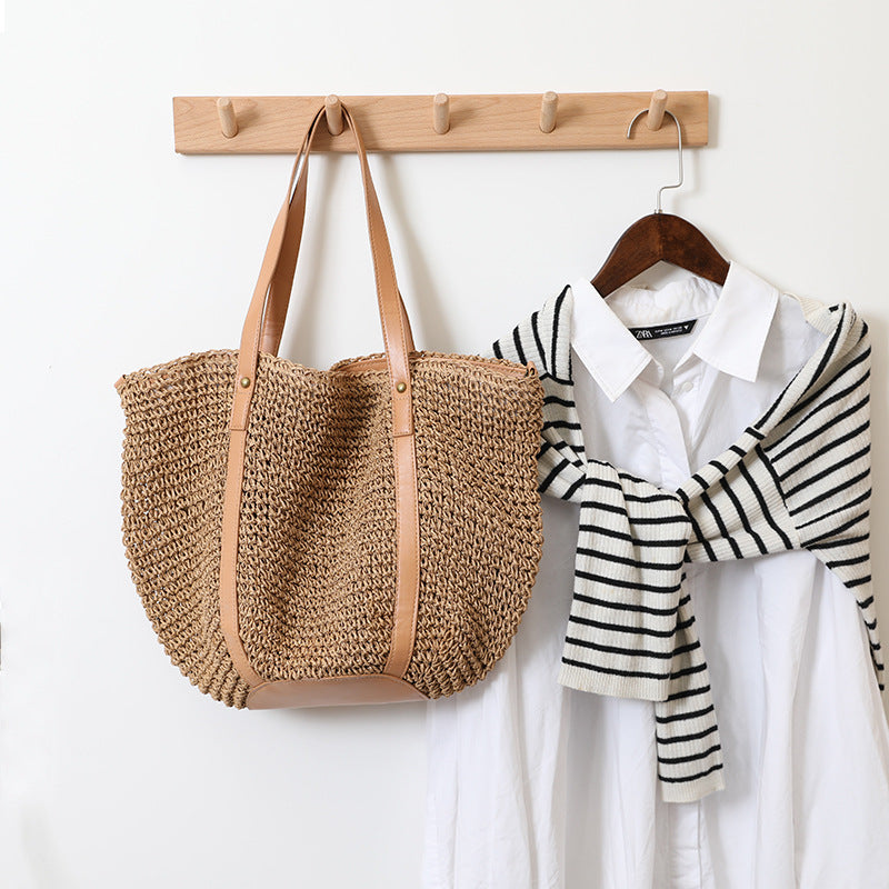 Damen Handtasche aus handgefertigtem Naturmaterial mit eleganten Lederakzenten Karnz
