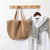 Damen Handtasche aus handgefertigtem Naturmaterial mit eleganten Lederakzenten Karnz