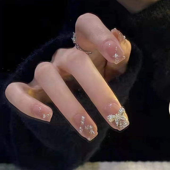 Glamouröse Glitter-Kunstnägel mit Schmetterlingselement Karnz