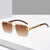 Damen exklusive Designer-Sonnenbrille mit luxuriösen Akzenten Karnz