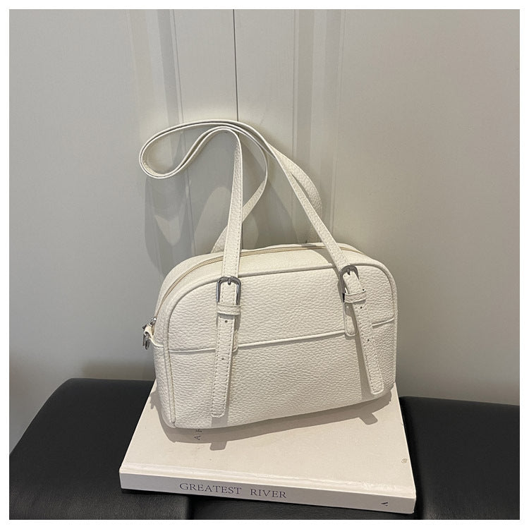 Strukturierte Handheld-Tasche