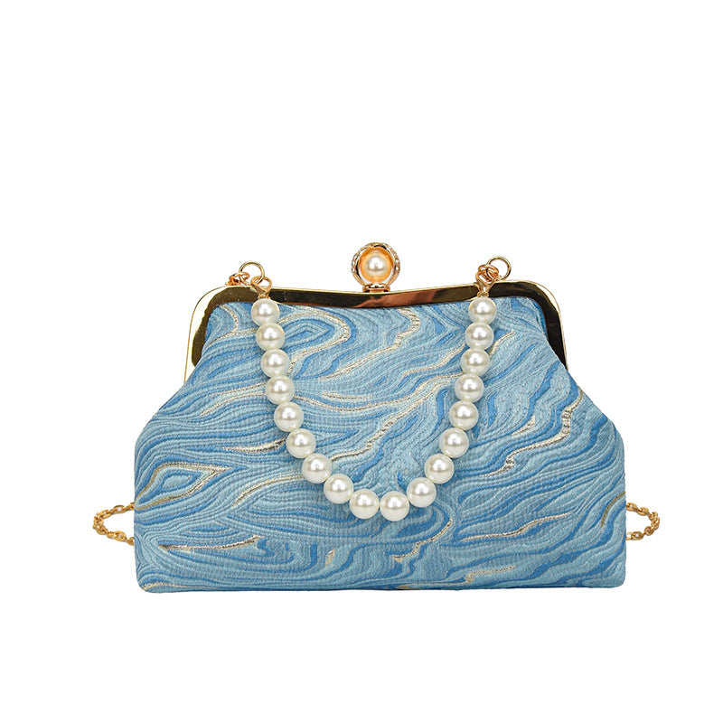 Elegante perlenverzierte Abendhandtasche