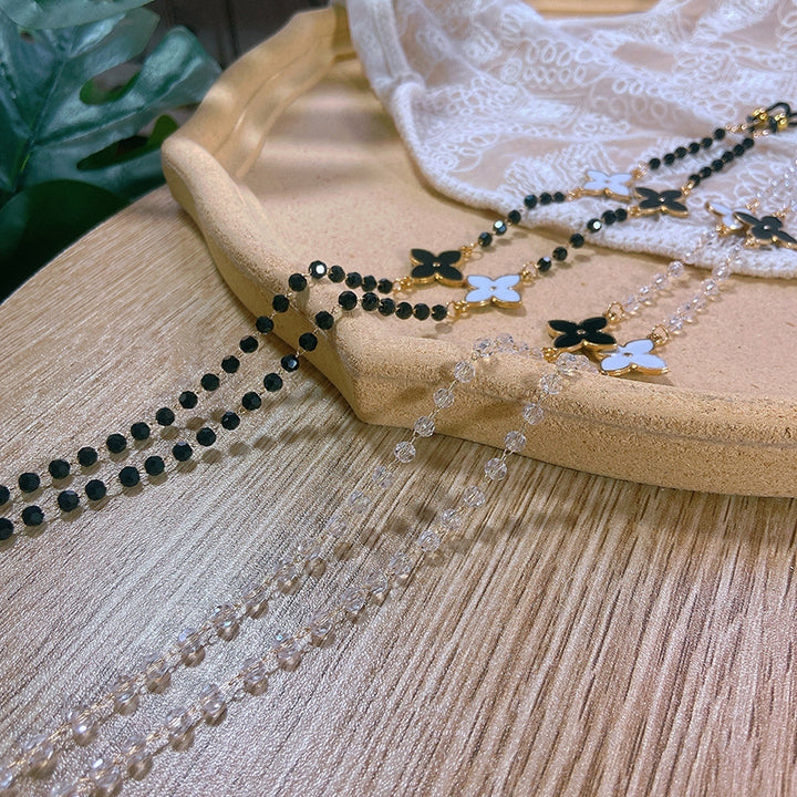 Elegante Perlenkette mit Blütenanhängern Karnz